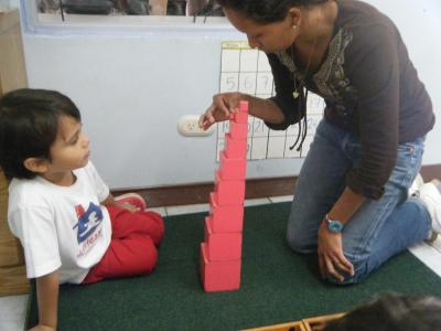 Brenda working with one of the children in the school